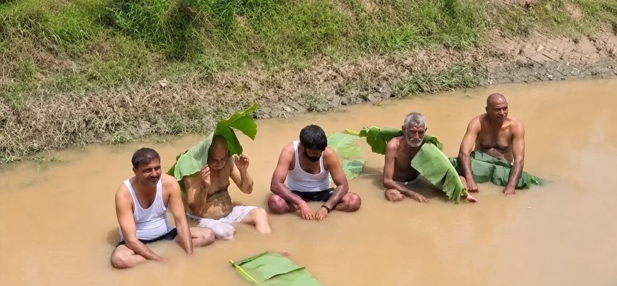सिंचाई के पानी को लेकर भड़के किसान, नहर में उतरकर किया जल सत्याग्रह